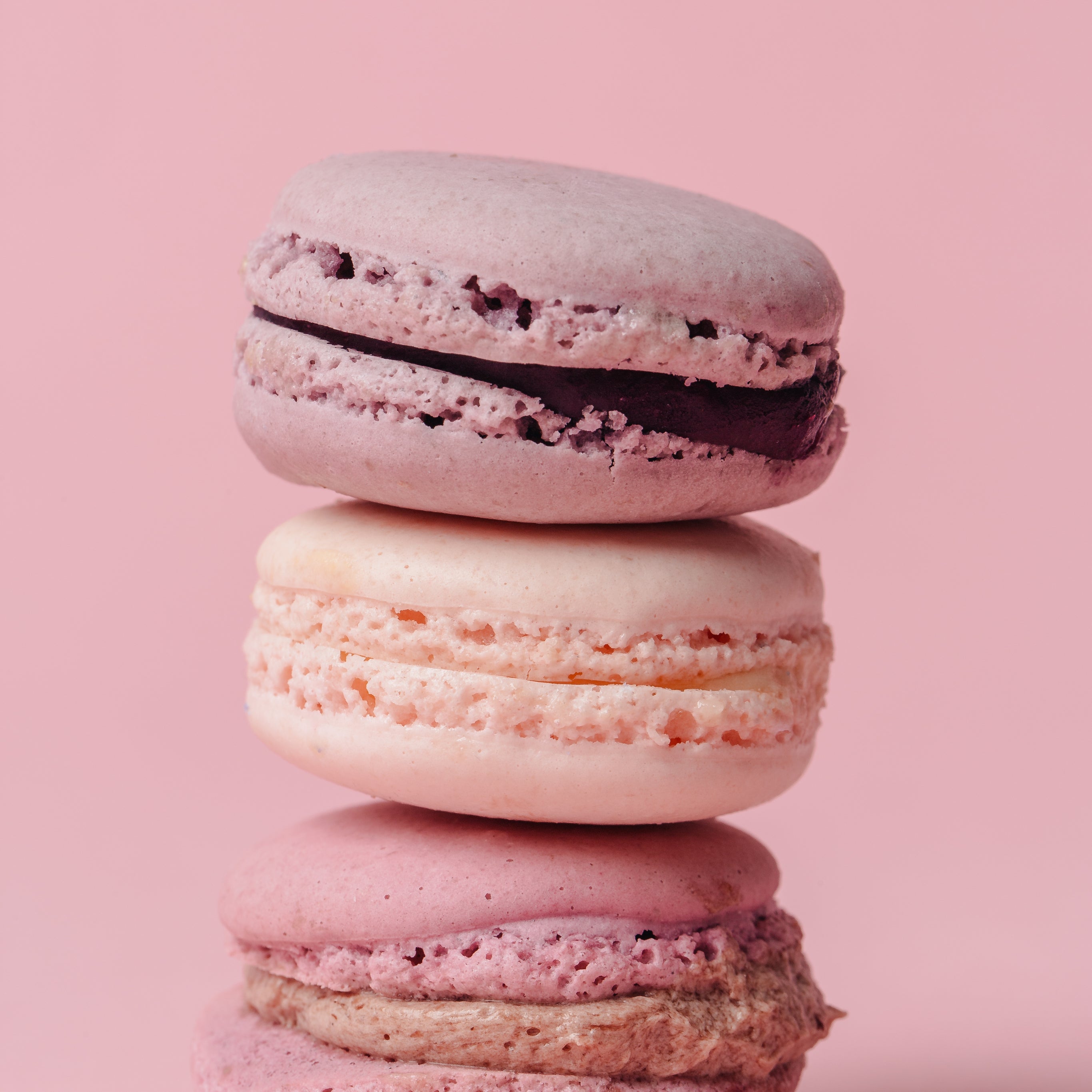 stack-of-pink-macarons-on-pink.jpg